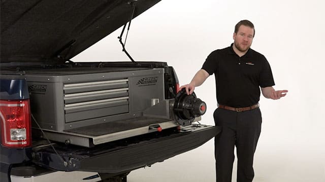 A man touching a TQM wheel end
